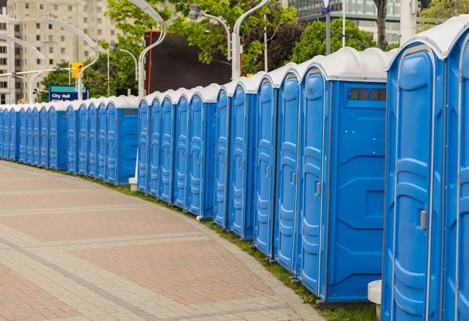 a line of portable restrooms at a sporting event, providing athletes and spectators with clean and accessible facilities in Biscayne Park, FL